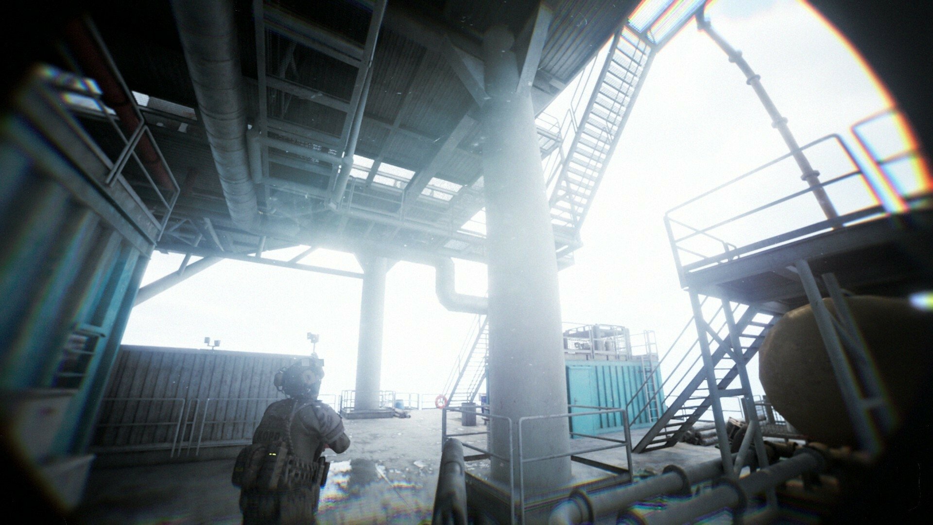 A high-definition desktop wallpaper of a video game featuring a bodycam perspective, showcasing an industrial setting with a soldier walking amidst metal structures and stairways.