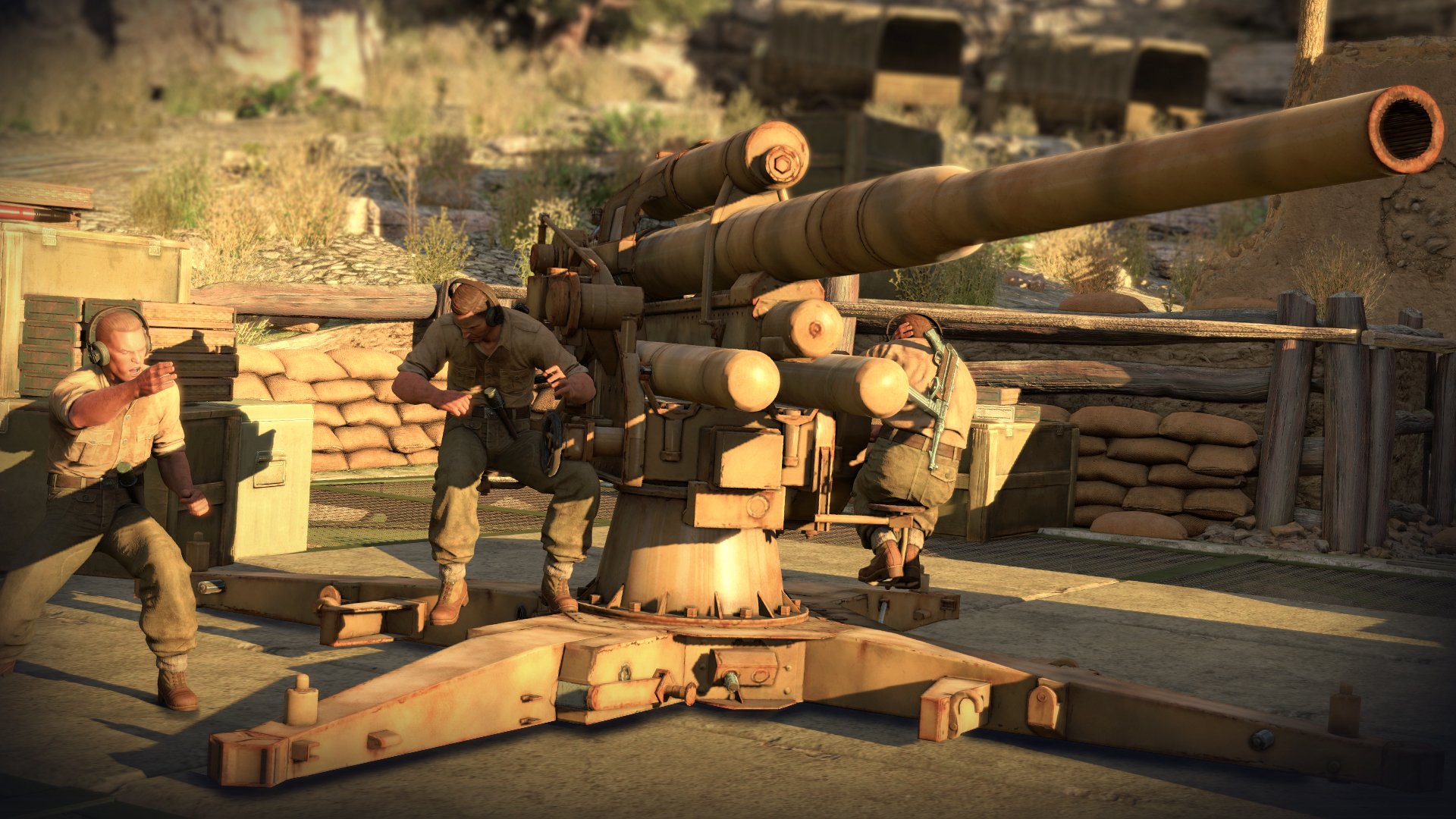 HD desktop wallpaper from the video game Sniper Elite III, featuring soldiers operating a large artillery gun in a desert military setting.