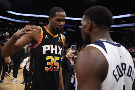 HD desktop wallpaper featuring Kevin Durant of the Phoenix Suns and Anthony Edwards of the Minnesota Timberwolves in conversation on the basketball court.