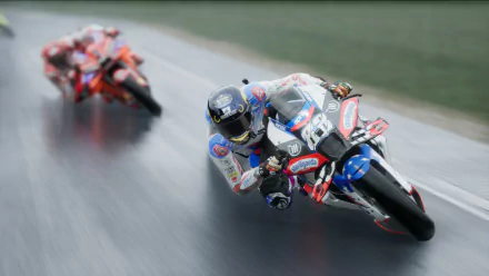 HD desktop wallpaper from the video game MotoGP 24 featuring two racers cornering on a track.