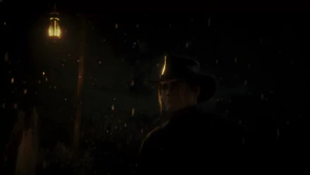 4K Ultra HD image of Arthur Morgan from Red Dead Redemption 2 standing in the rain at night, illuminated by a nearby lantern.