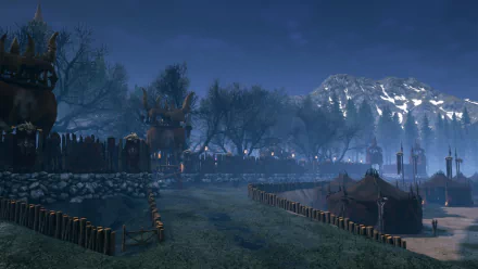 A high-definition wallpaper of the video game Rise Online, featuring a serene landscape with tents, wooden fences, trees, and snow-capped mountains under a dusky sky.