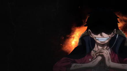 One Piece character grinning with flames in the background, rendered in 4K Ultra HD for a dynamic PC desktop wallpaper.