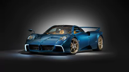 HD desktop wallpaper featuring the Pagani Huayra Epitome in a striking blue color against a dark background, highlighting the car's sleek design and luxurious appeal.