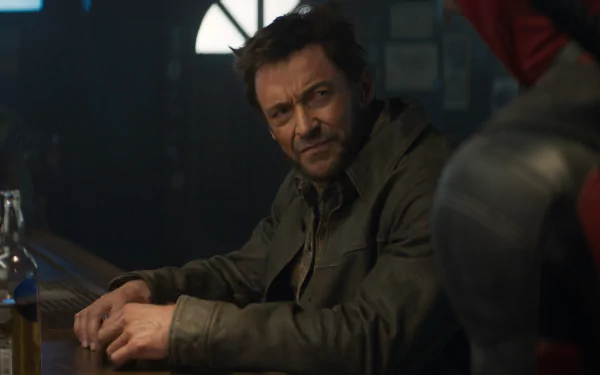 HD desktop wallpaper from a movie scene featuring Wolverine sitting at a bar with Deadpool partially visible in the background.