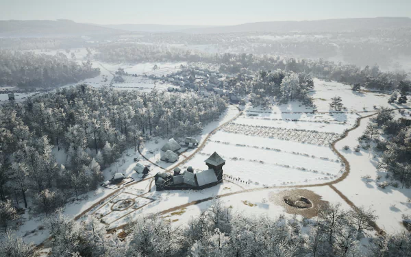 HD desktop wallpaper from the video game Manor Lords, featuring a winter scene with a snow-covered medieval village surrounded by forested hills.