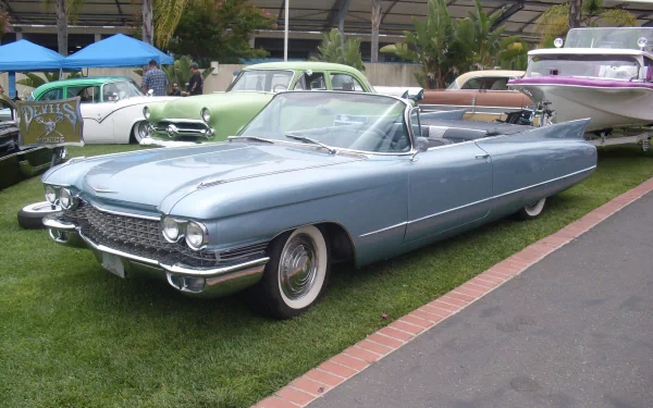 Classic light blue Cadillac convertible displayed at a car show, captured in HD quality as a desktop wallpaper and background.
