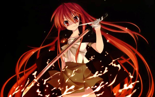A vibrant HD desktop wallpaper featuring an anime character from Shakugan No Shana, wielding a sword amid swirling flames with striking red hair and intense eyes.