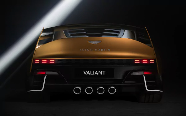 HD desktop wallpaper featuring the rear view of an Aston Martin Valiant, highlighting its sleek design and quad exhaust system.