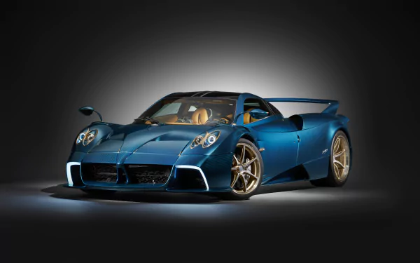 HD desktop wallpaper featuring the Pagani Huayra Epitome in a striking blue color against a dark background, highlighting the car's sleek design and luxurious appeal.