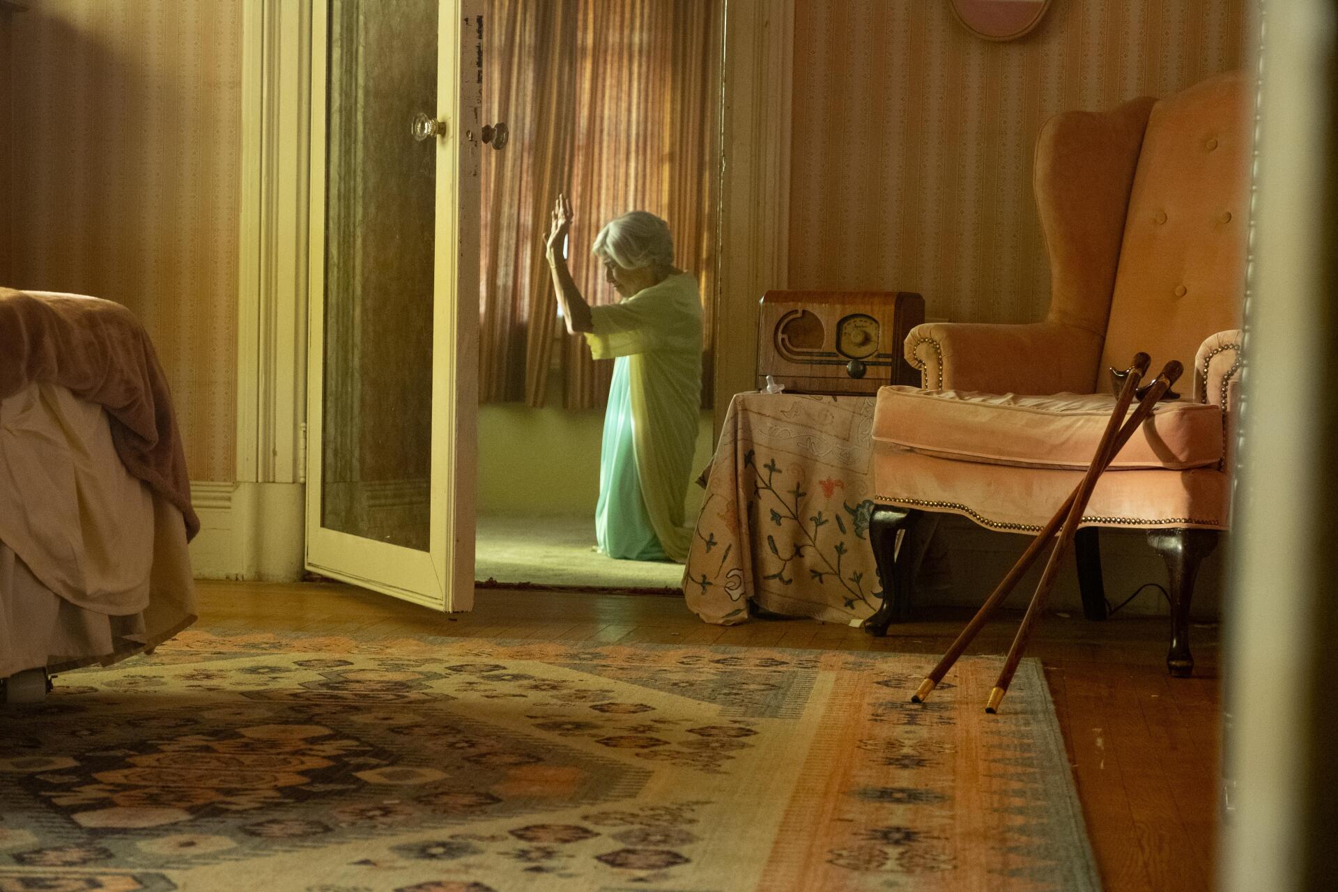 A 4K Ultra HD wallpaper featuring imagery from the movie The Front Room, showcasing its thematic elements in a visually striking format.