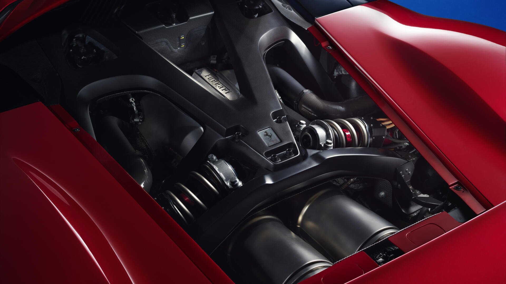 Close-up of the Ferrari F80's powerful engine, showcasing its sleek design and advanced engineering. A stunning 4K Ultra HD wallpaper for automotive enthusiasts.