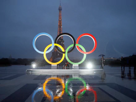 A stunning HD wallpaper featuring the Eiffel Tower, symbolizing the Olympic Games Paris 2024, showcasing the spirit of sports and celebration in the heart of France.