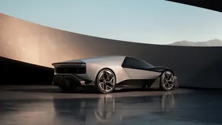 A sleek silver Lotus Theory 1 car featured in a modern setting, captured in stunning 4K Ultra HD, showcasing its innovative design and dynamic lines.