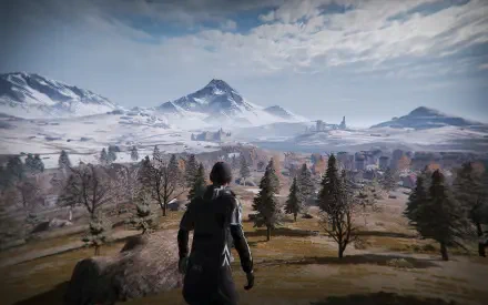 A dramatic HD wallpaper from Playerunknown's Battlegrounds, showcasing a character overlooking a vast landscape of mountains and trees under a bright sky.