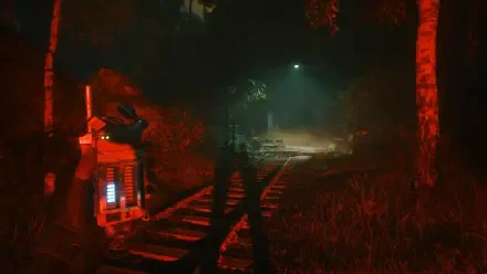A dark, atmospheric scene from the video game A Quiet Place: The Road Ahead, featuring a blurred figure along a railway, illuminated by eerie light in a dense forest setting.