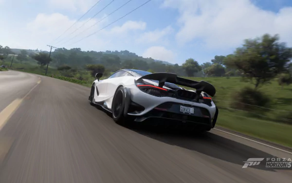 HD PC desktop wallpaper featuring a McLaren 765LT vehicle from the video game Forza Horizon 5, captured speeding on a scenic road.