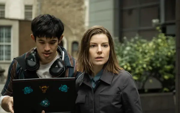 A sleek 4K Ultra HD wallpaper featuring Aimee-Ffion Edwards from the TV show Slow Horses, showcasing the show's distinctive style and atmosphere.