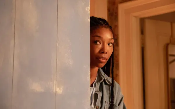 A 4K Ultra HD movie wallpaper featuring Brandy Norwood from The Front Room, showcasing vibrant colors and cinematic elements for an engaging desktop background.