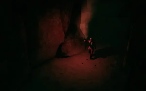 A dark, atmospheric scene from the video game Hollowbody, featuring a character exploring a cave with a flashlight, creating an eerie yet captivating background for a PC desktop wallpaper.