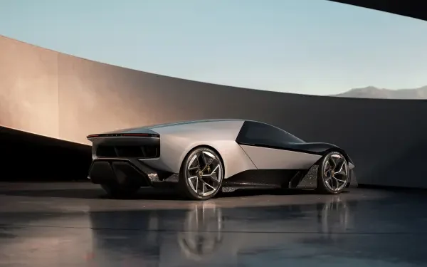 A sleek silver Lotus Theory 1 car featured in a modern setting, captured in stunning 4K Ultra HD, showcasing its innovative design and dynamic lines.