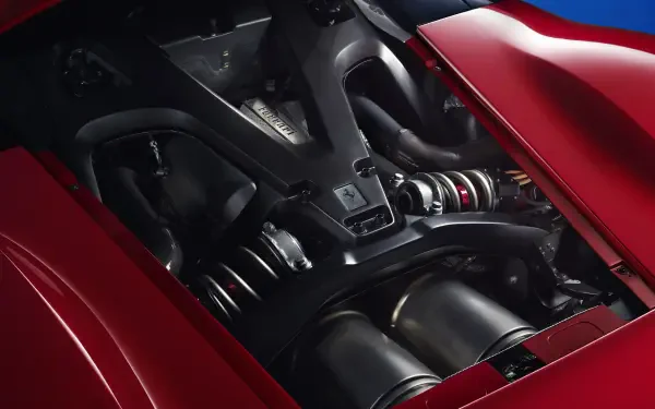 Close-up of the Ferrari F80's powerful engine, showcasing its sleek design and advanced engineering. A stunning 4K Ultra HD wallpaper for automotive enthusiasts.