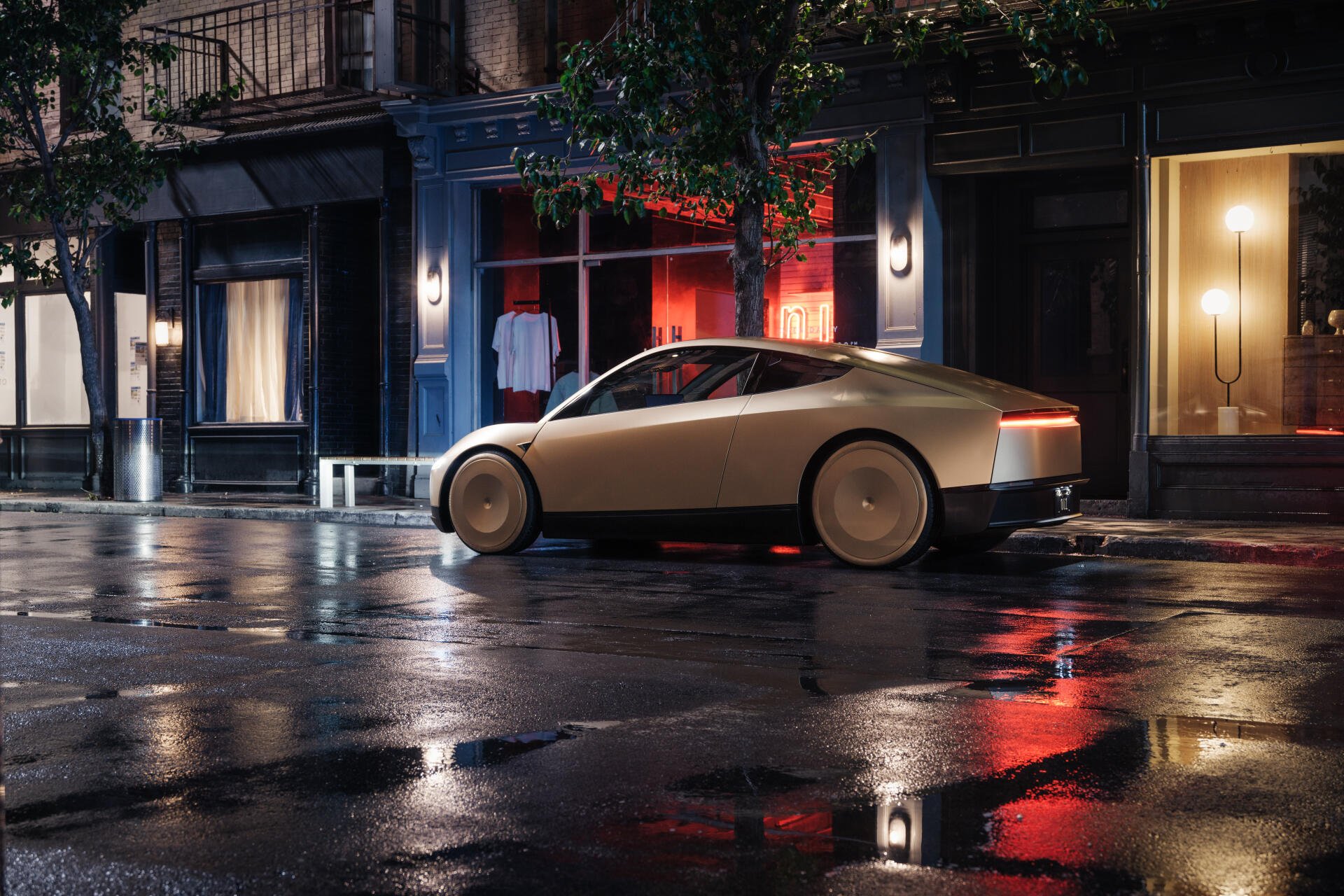 A sleek Tesla robotaxi, known as the Cybercab, is parked on a rain-soaked street, reflecting vibrant lights from nearby shops in this captivating 4K Ultra HD wallpaper.
