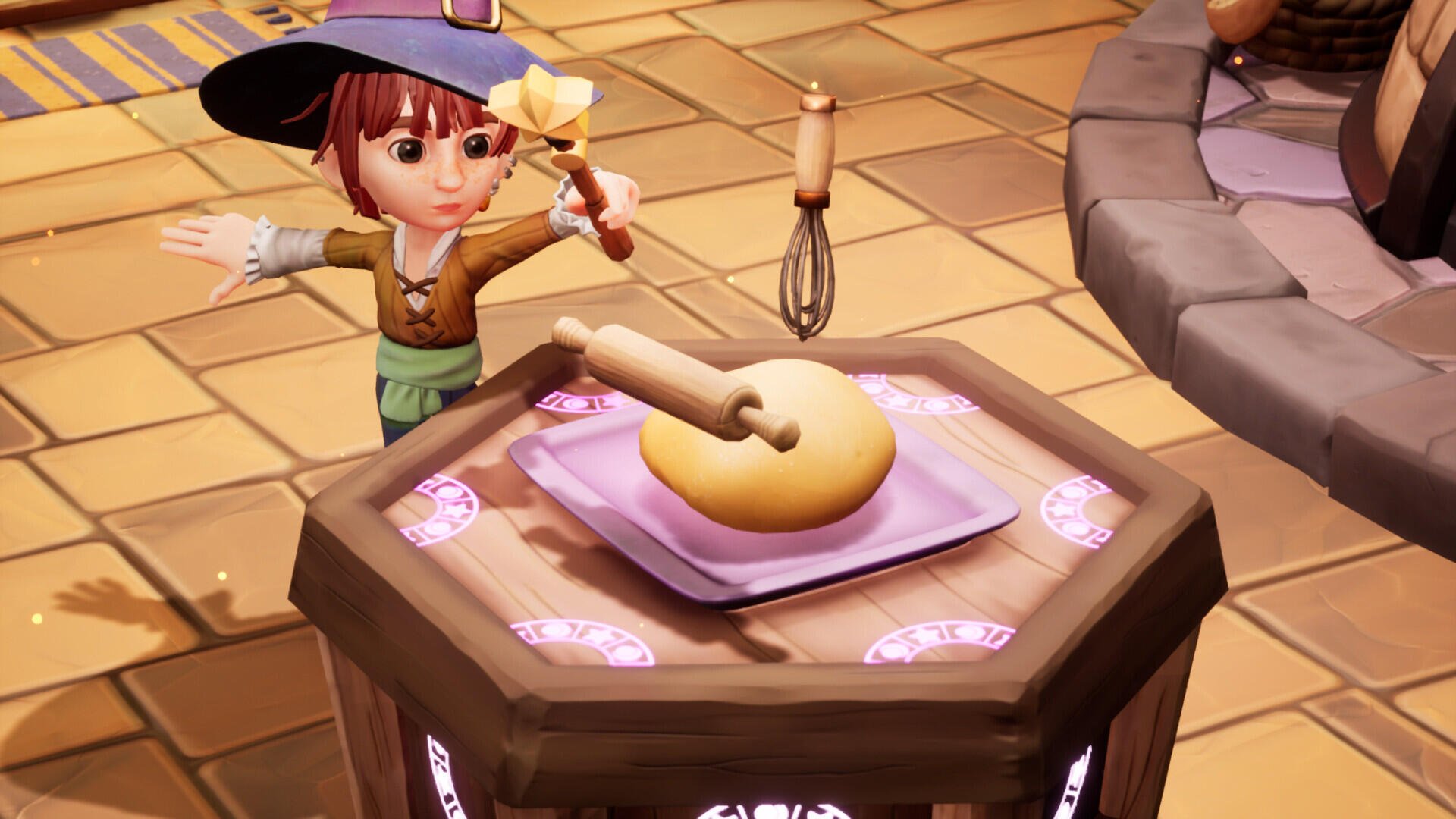 A whimsical scene from the video game Magical Bakery features a young character in a hat, holding a flower, with a rolling pin and dough on a decorative table. HD wallpaper background.