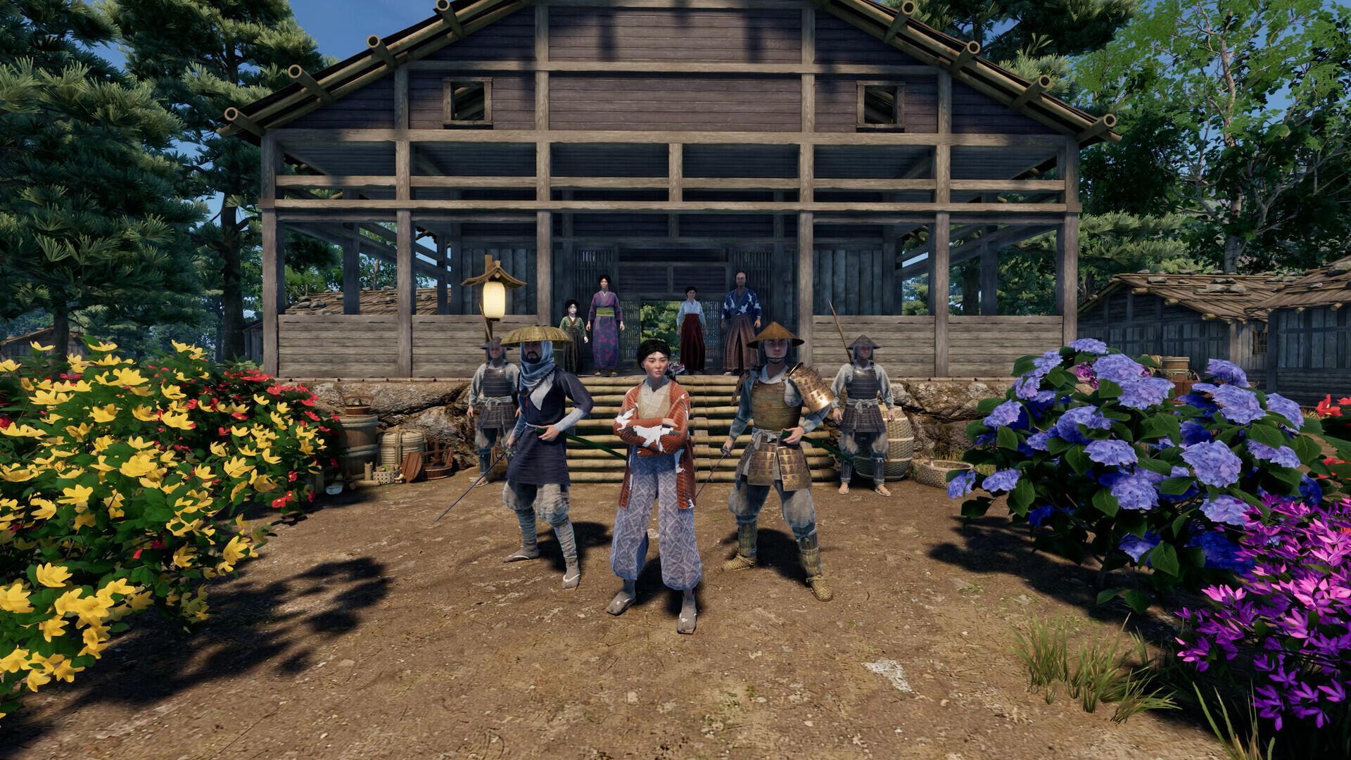 A vibrant scene from the video game Sengoku Dynasty, featuring characters in traditional attire standing in front of a wooden house, surrounded by colorful flowers and lush greenery.