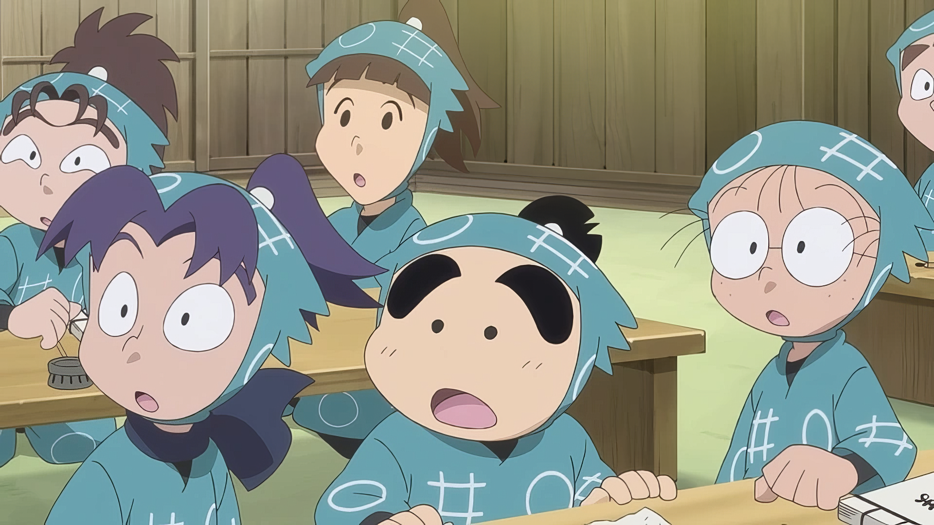 Animated scene from Gekijouban Nintama Rantarou: Dokutake Ninja Tai Saikyou no Gunshi, featuring a group of surprised ninja characters in a classroom setting. HD wallpaper background.