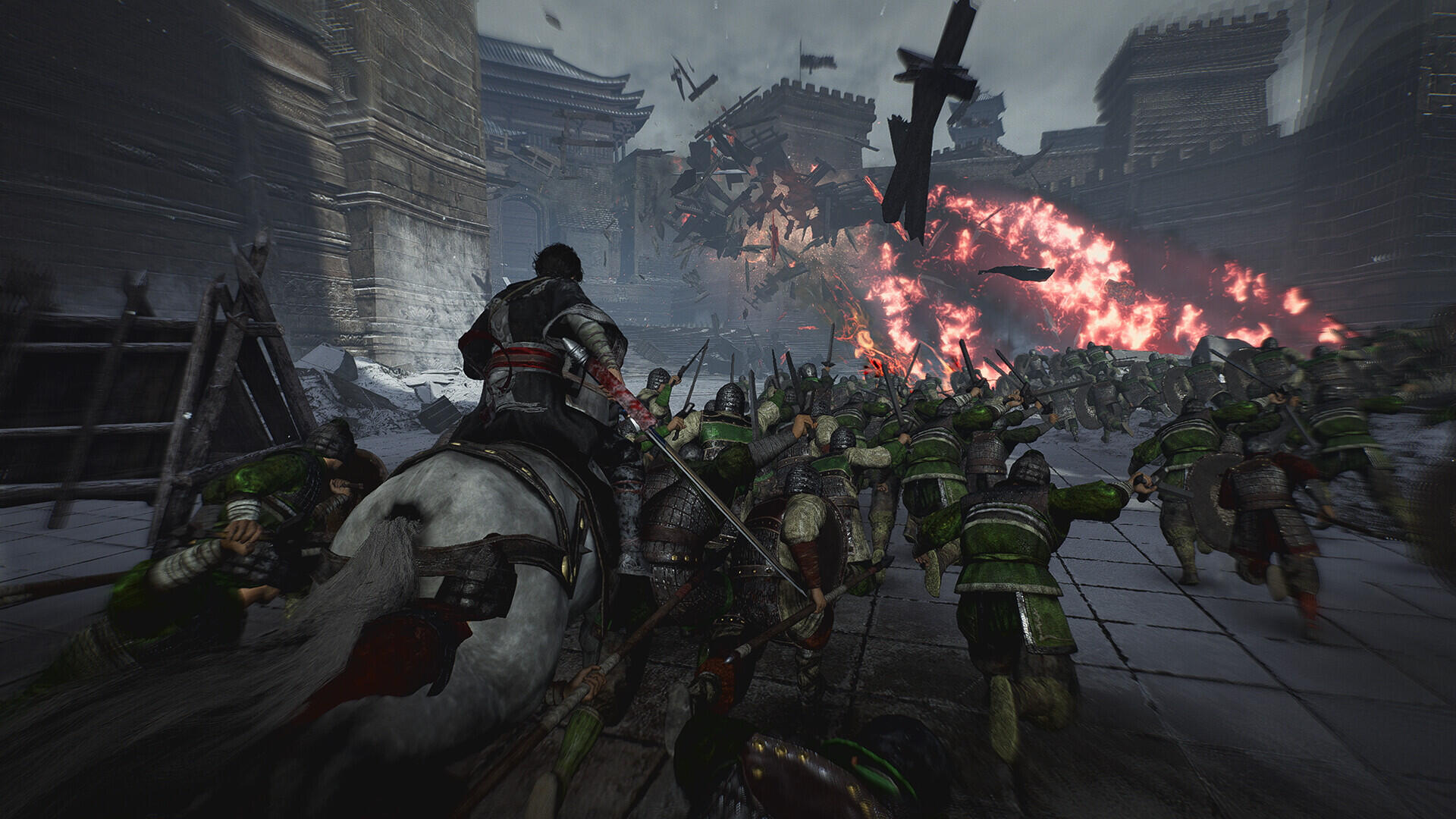 A dynamic scene from the video game Dynasty Warriors: Origins, featuring a warrior on horseback charging through a battlefield filled with soldiers and dramatic flames in the background.