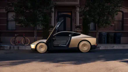 A sleek Tesla robotaxi, known as the Cybercab, stands parked with its door open, set against an urban backdrop. This 4K Ultra HD image captures modern automotive design.