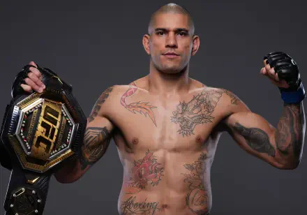 Alex Pereira, the UFC champion, poses confidently holding his title belt, showcasing his tattoos against a dark background. Ideal for MMA and sports enthusiasts.