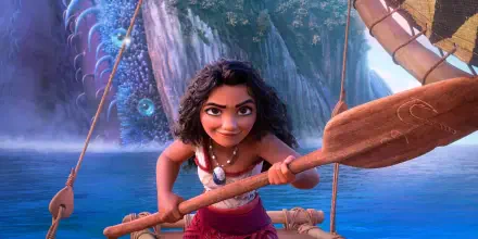 Moana Waialiki navigates her canoe in this vibrant HD wallpaper for Moana 2, showcasing her adventurous spirit against a stunning ocean backdrop.