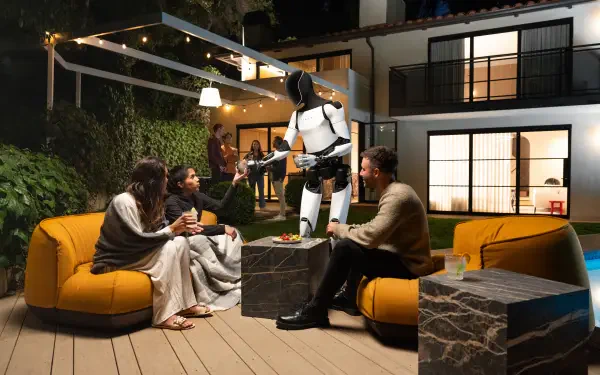 Tesla Optimus robot interacts with a group of people seated outdoors at night, captured in a 4K Ultra HD PC desktop wallpaper featuring Tesla Bot technology.
