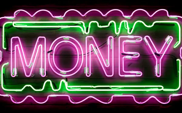 A vibrant 4K Ultra HD wallpaper featuring a neon sign that boldly displays the word MONEY in bright pink and green colors on a dark background.