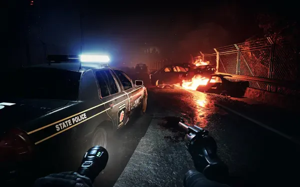 Dark and atmospheric HD wallpaper from No More Room In Hell 2, featuring a state police car with flashing lights and a burning vehicle in a gritty, zombie-infested landscape.