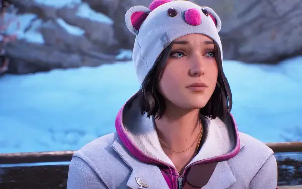 A HD PC desktop wallpaper featuring a character from Life is Strange: Double Exposure, wearing a playful bear hat, set against a serene snowy backdrop.