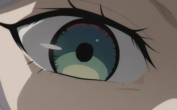 Close-up of an expressive eye from the anime Frieren: Beyond Journey's End, showcasing vibrant colors and intricate detailing, designed as an HD PC desktop wallpaper.