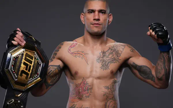 HD desktop wallpaper of UFC MMA fighter Alex Pereira holding a championship belt, showcasing his tattoos and confident stance against a dark background.