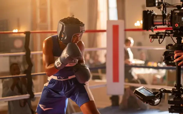 A dynamic scene from the movie The Fire Inside, featuring Ryan Destiny in a boxing match, captured in vibrant 4K Ultra HD, showcasing the intensity of the sport.