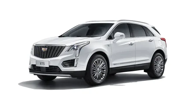 A sleek white Cadillac XT5 displayed at an angle, showcasing its modern design and elegant features, suitable for an HD desktop wallpaper or background.