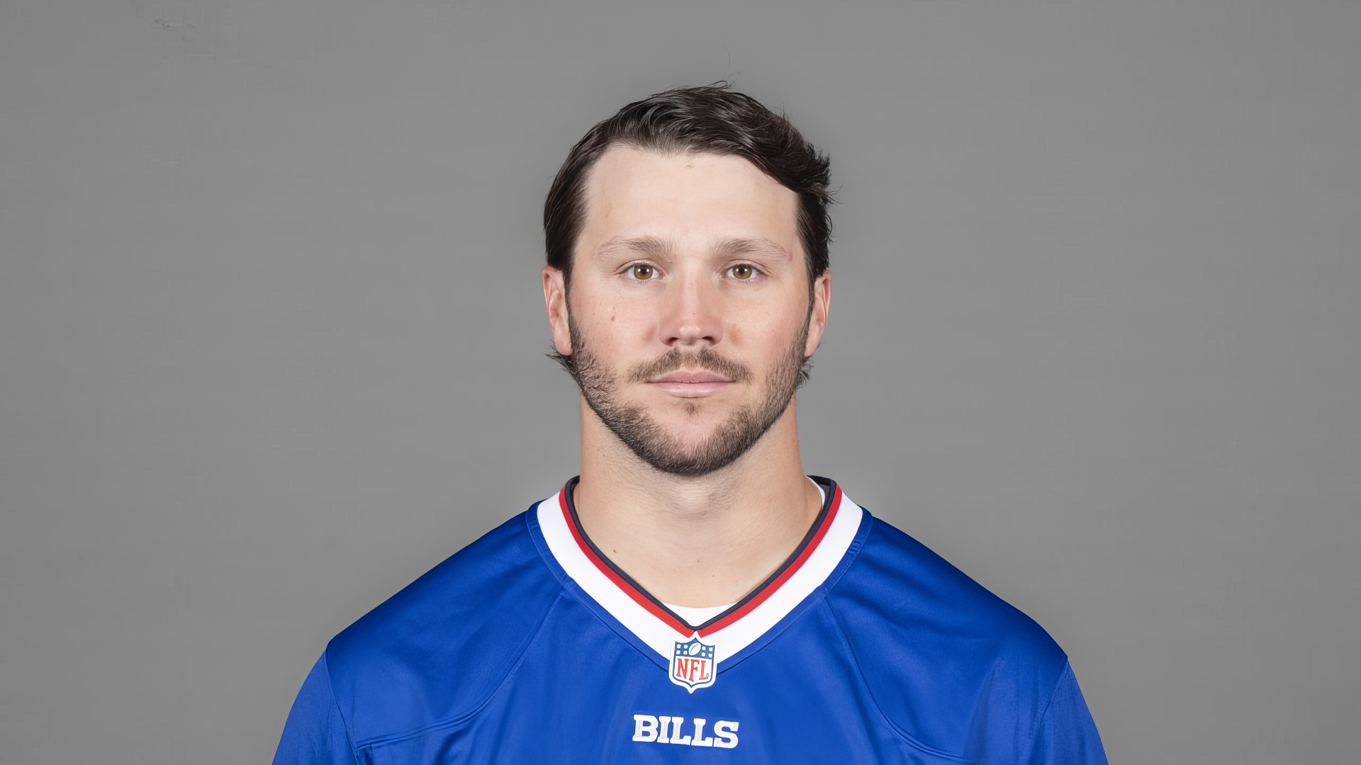 HD wallpaper featuring Buffalo Bills quarterback Josh Allen in his team jersey, showcasing the spirit of NFL football.