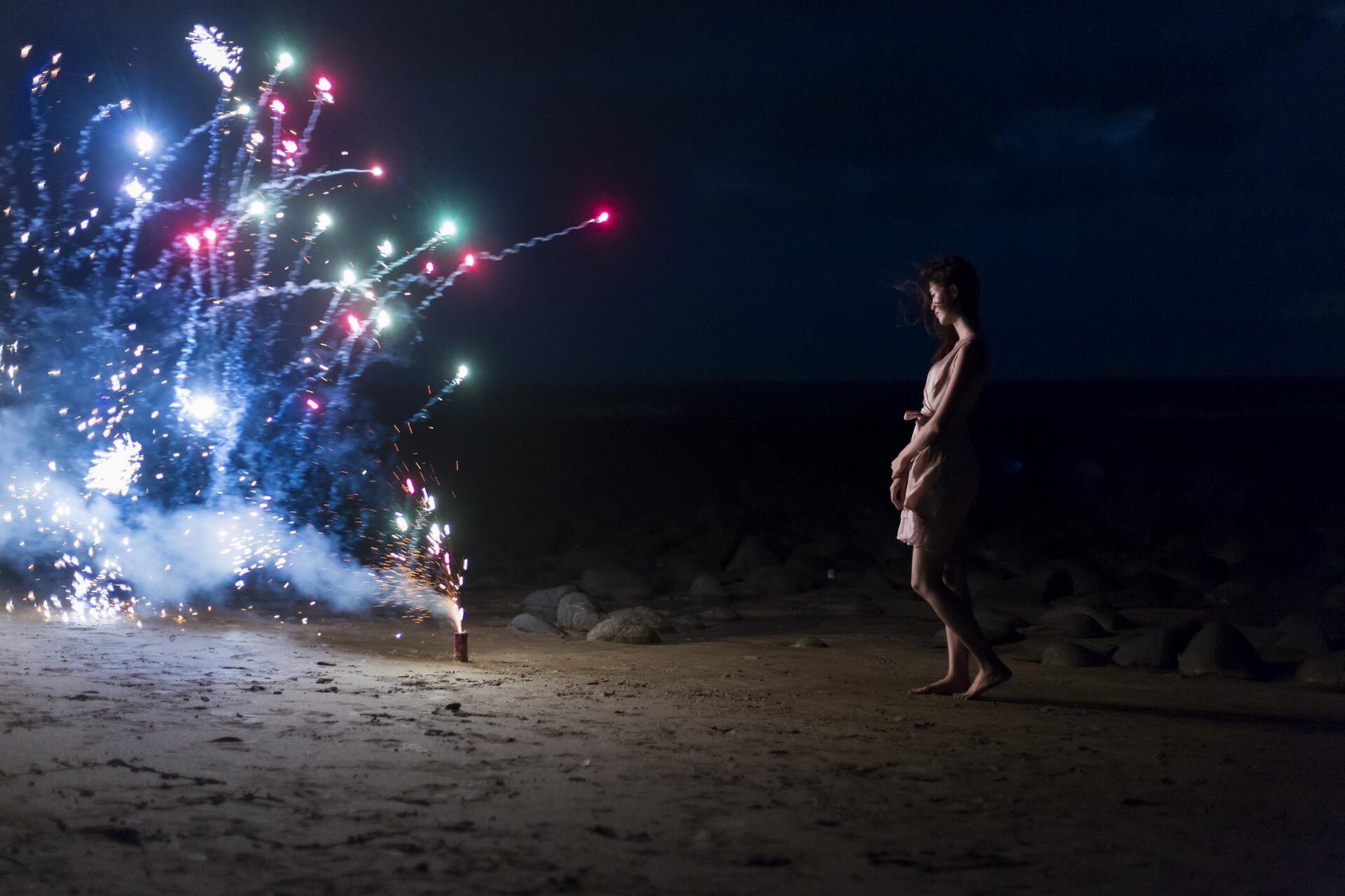 Download Woman Fireworks Night Beach 8k Ultra HD Wallpaper