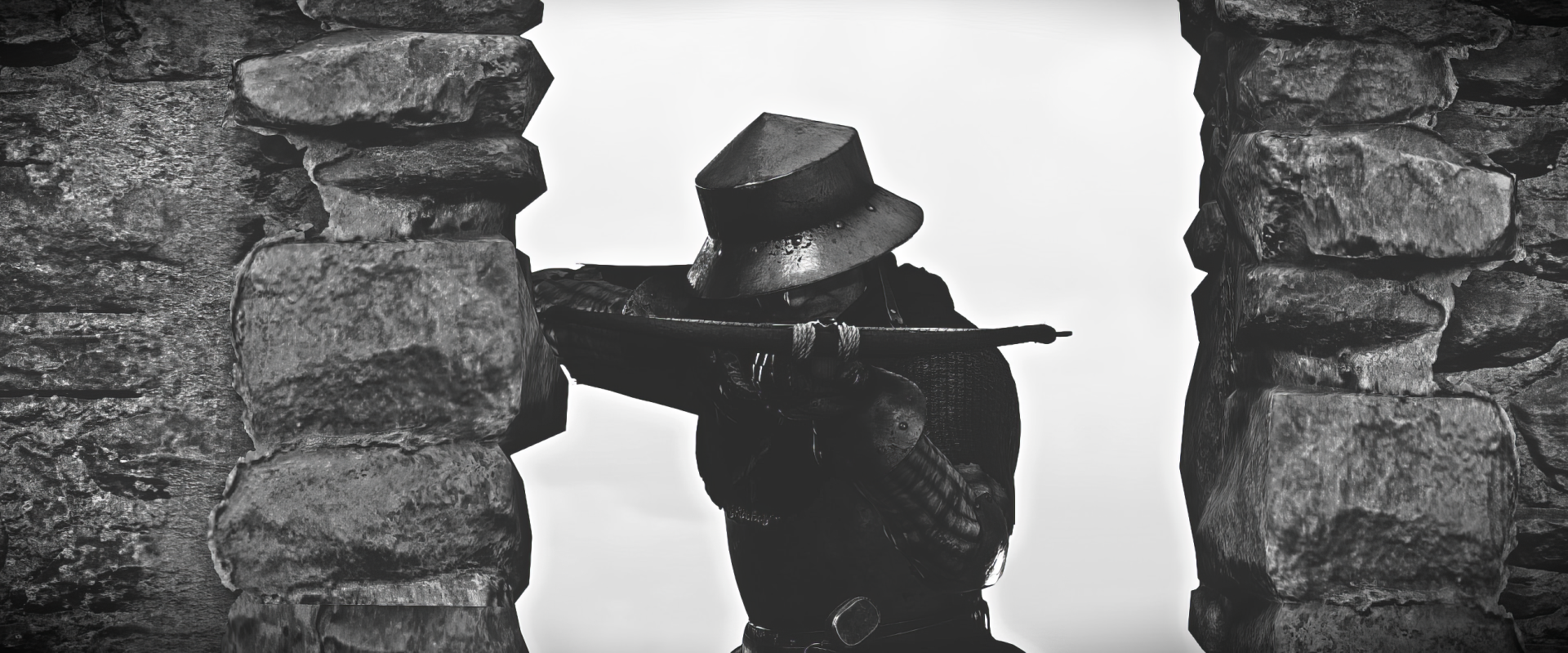 An archer poised with a bow, framed by a stone wall, from Kingdom Come: Deliverance II, depicted in striking black and white. This HD wallpaper captures a moment of tension and focus.