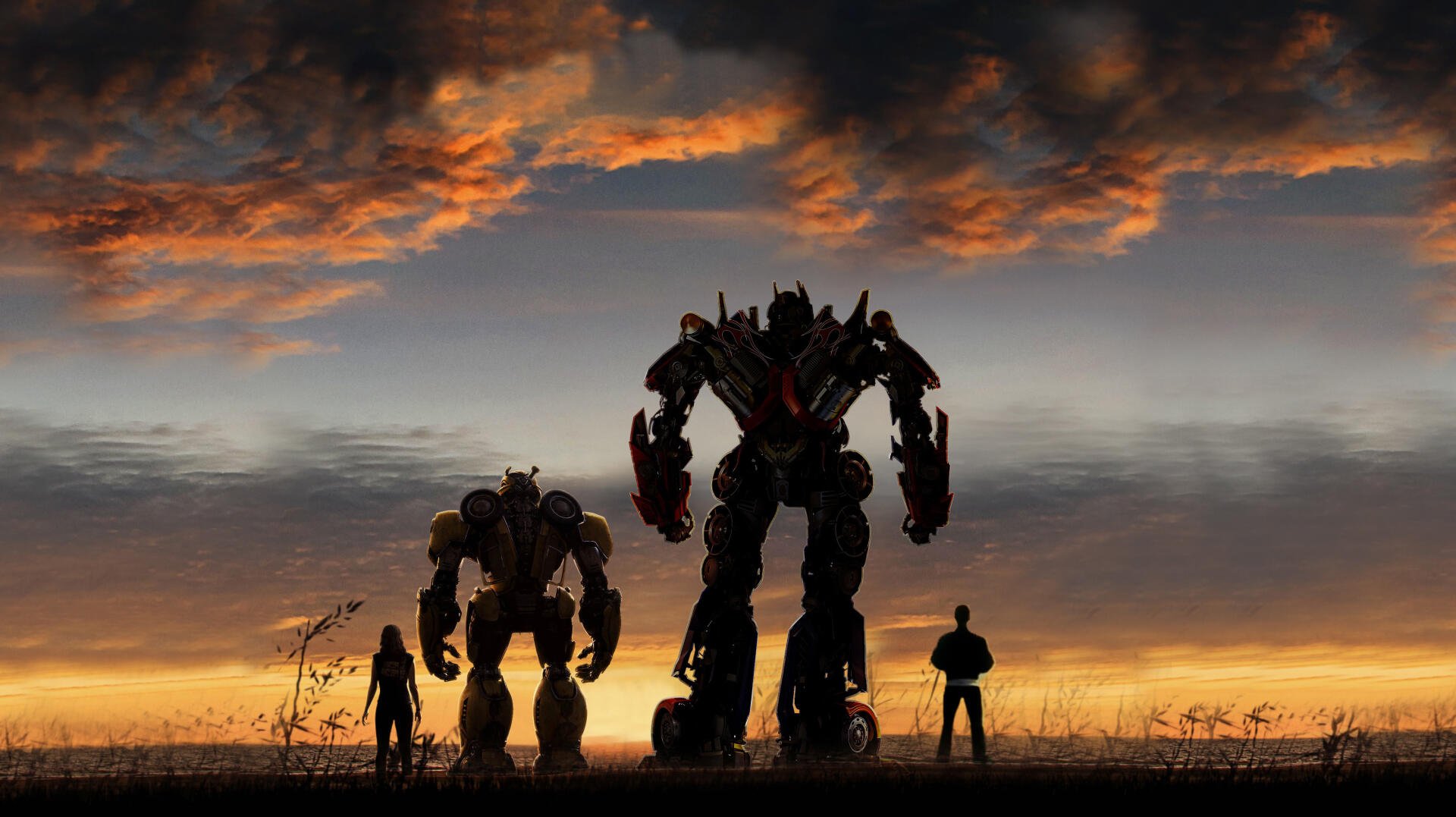 Bumblebee (movie) HD PC desktop wallpaper background: silhouetted Autobots and human figures stand on a field beneath a dramatic sunset and cloud-filled sky.