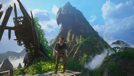 A stunning HD wallpaper from Uncharted 4: A Thief's End, featuring the protagonist standing on a cliff with lush greenery and dramatic mountains under a vibrant sky.
