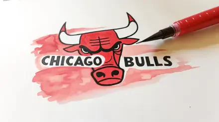 A detailed Chicago Bulls logo painted with red watercolor on paper, designed as a 4K Ultra HD PC desktop wallpaper and background.