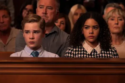 HD PC desktop wallpaper featuring a scene from the TV show Ginny & Georgia with two main characters seated among a serious audience.