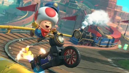 4K Ultra HD Mario Kart World wallpaper showing Toad joyfully riding a motorcycle on a winding track with a steam train in the background.